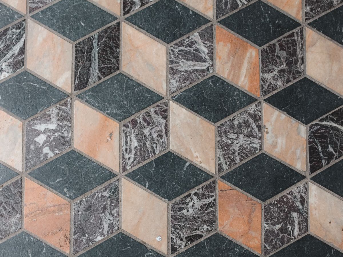 Geometric three-dimensional marble floor in an entryway
